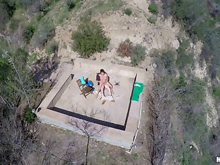 Stunning brunette tourist gets fucked outdoors in the desert